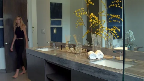 Model in Bathroom Stock Footage 99480404