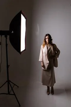 A model with a beautiful makeup in the studio on a white background. professi Фото