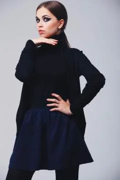 Model in black clothes with dark makeup Stock Photos