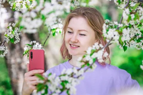 Model in blossoming trees Stock Photos