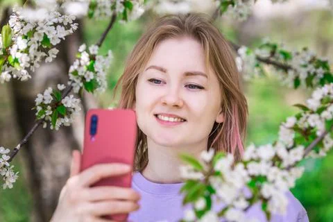 Model in blossoming trees Stock Photos