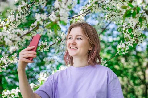 Model in blossoming trees Stock Photos