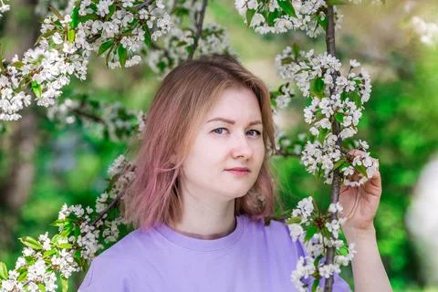 Model in blossoming trees Stock Photos