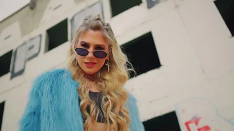 Model in blue fur coat posing.  trend Stock Footage 304271526