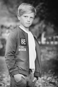 Model boy trying various poses for monochrome portrait photos in skate park Stock Photos