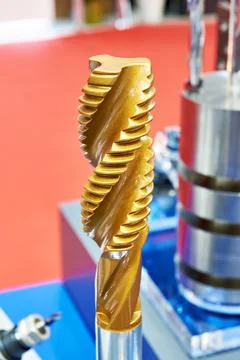 Model of brass drilling bit for threading Stock Photos