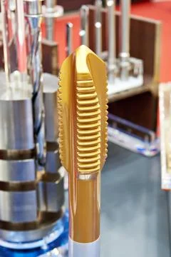 Model of brass drilling bit for threading Stock Photos