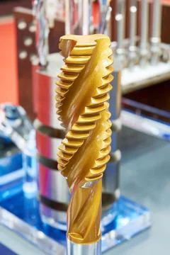 Model of brass drilling bit for threading Stock Photos