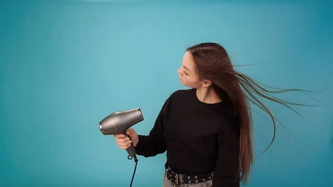 Model brunette waves hair drying Stock Footage 157631258