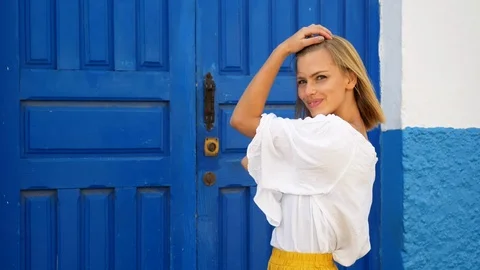 Model brushing hair with hands Stock Footage 105355366