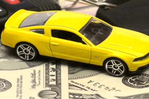 Model car and cash loop V1 - NTSC Stock Footage 666314