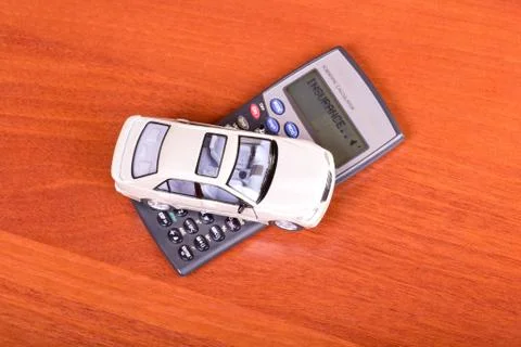 Model car on a calculator Stock Photos