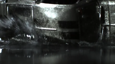 MODEL CAR CRASHES INTO WATER # 3 Stock Footage 25271564