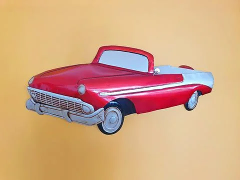 The model of the car is hung on the wall Stock Photos