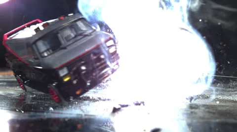 MODEL CAR THROUGH EXPLOSION Stock Footage 25299046