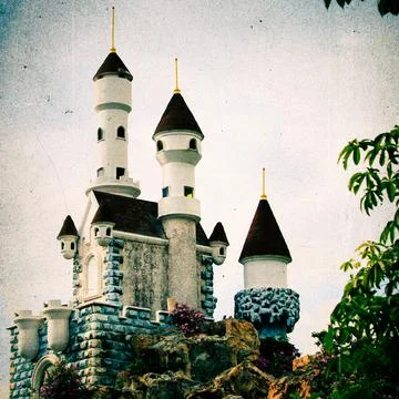 Model castle processed in grunge style Stock Photos