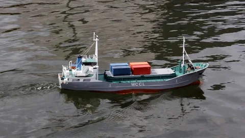 Model container cargo boat sailing demonstration at model boat regatta Stock Footage 96076690