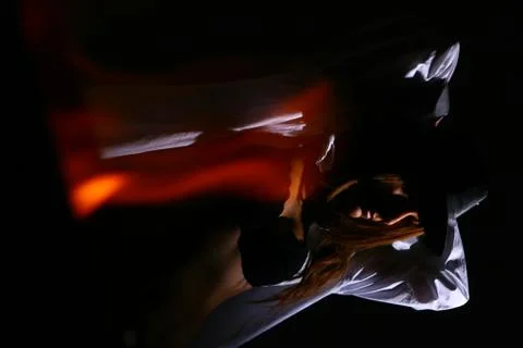 Model dance behind Fire erotic dance Stock Photos