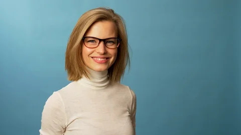 Model doing some intellectual poses while wearing different glasses Video stock 103627866