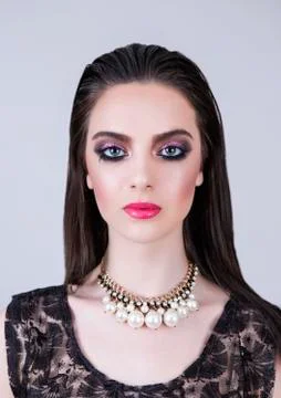 Model with a doll face, big lips and eyes. Stock Photos
