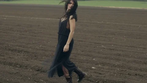 Model in dress and boots posing 動画素材 76204018