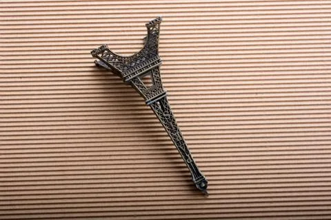 Model Eiffel tower is on cardboard Stock Photos
