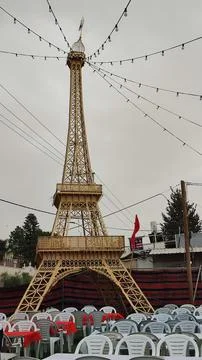 Model of the Eiffel Tower at a wedding in a Muslim village, architecture ob.. Stock Photos