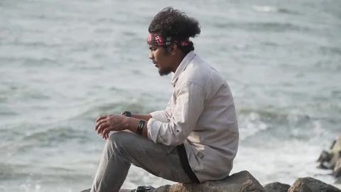 Model enjoying time looking into the sea 60fps youth young celebrating desperate Stock Footage 107878136