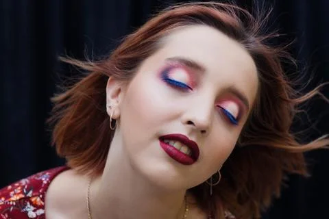 Model face poses on the camera Stock Photos