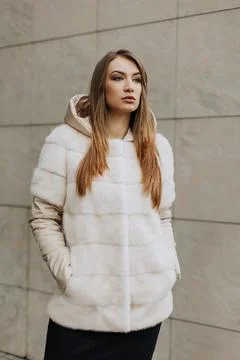 Model in a fur coat Stock Photos