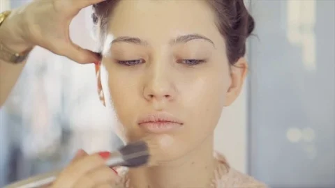 Model is getting a make up Stock-Footage 84590124