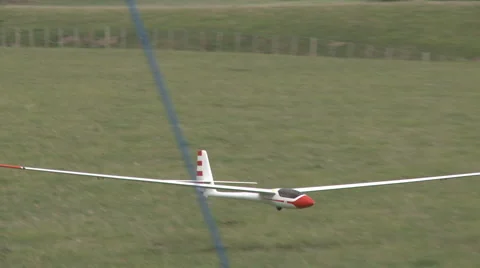 Model glider lands Stock Footage 2104255