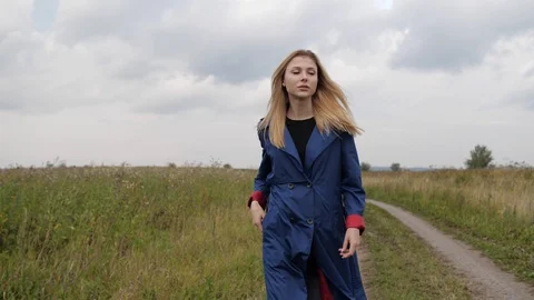 The model goes across the field Stock Footage 105290168