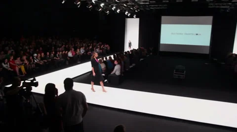Model goes by podium during fashion show of Sultanna Frantsuzova Stock Footage
