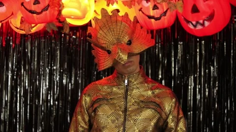 Model with golden eagle mask on halloween Stock Footage 242962638
