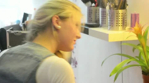 Model with hairdresser Stock Footage