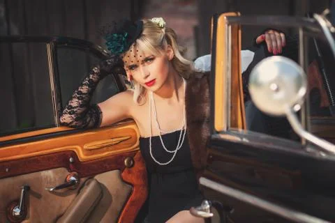 Model in hat with veil in car Stock Photos