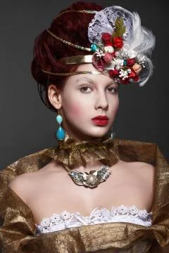 Model in historical look. Stock Photos