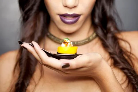 Model holding sushi Stock Photos