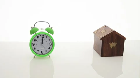 Model house and alarm clock Stock Footage 67646800