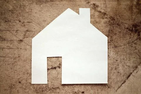 Model house, construction, house building Paper house icon on dirty canvas... Fotos de archivo