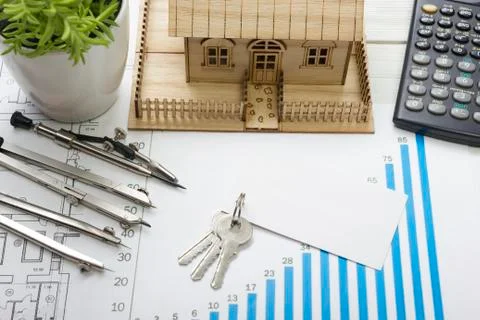 Model house, construction plan for house building, keys, blank business card Fotos de archivo
