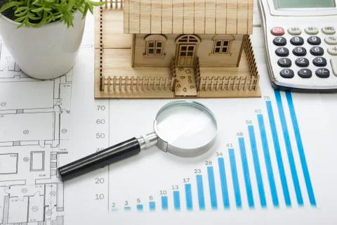 Model house, construction plan for house building, keys, divider compass Stock Photos