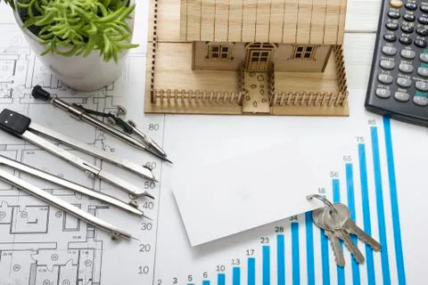 Model house, construction plan for house building, keys, blank business card Stock Photos