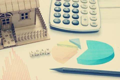 Model house, construction plan for house building, calculator. Real Estate Stock Photos