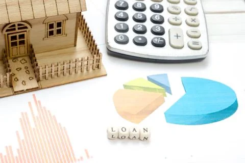 Model house, construction plan for house building, calculator. Real Estate Stock Photos