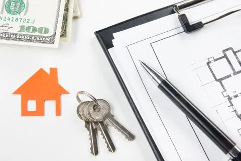 Model house, construction plan for house building, keys. Real Estate Concept Stock Photos