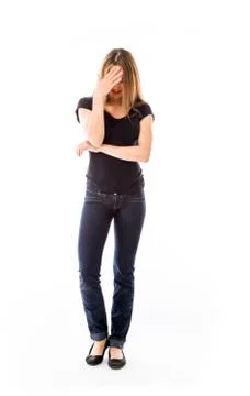 Model isolated on plain background ashamed hiding face in hand Stock Photos