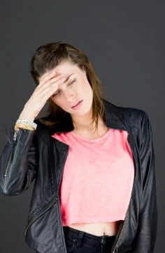 Model isolated on plain background ashamed hiding face in hand Stock Photos