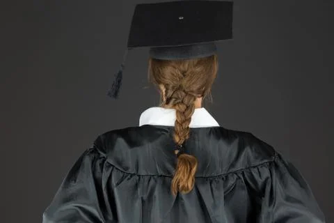 Model isolated on plain background back hands on hips Stock Photos